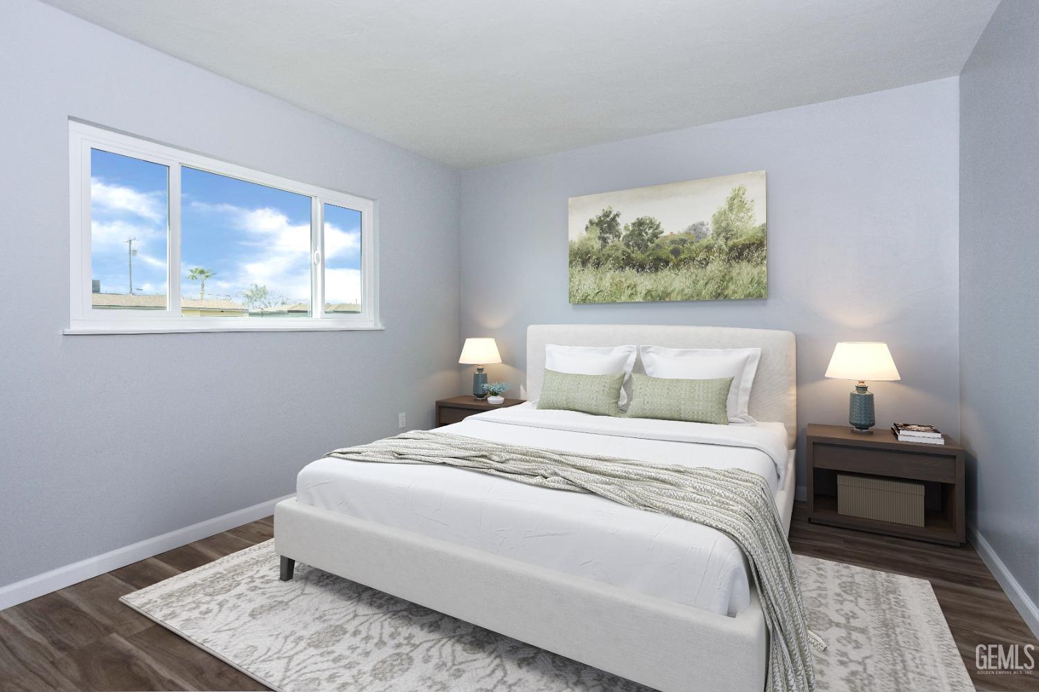 Undisclosed Address Shafter, CA 93263 - Photo 13 of 18 a bedroom with a bed and a window