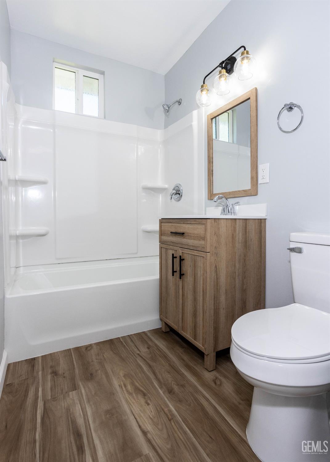 Undisclosed Address Shafter, CA 93263 - Photo 17 of 18 a bathroom with a toilet a sink and bathtub