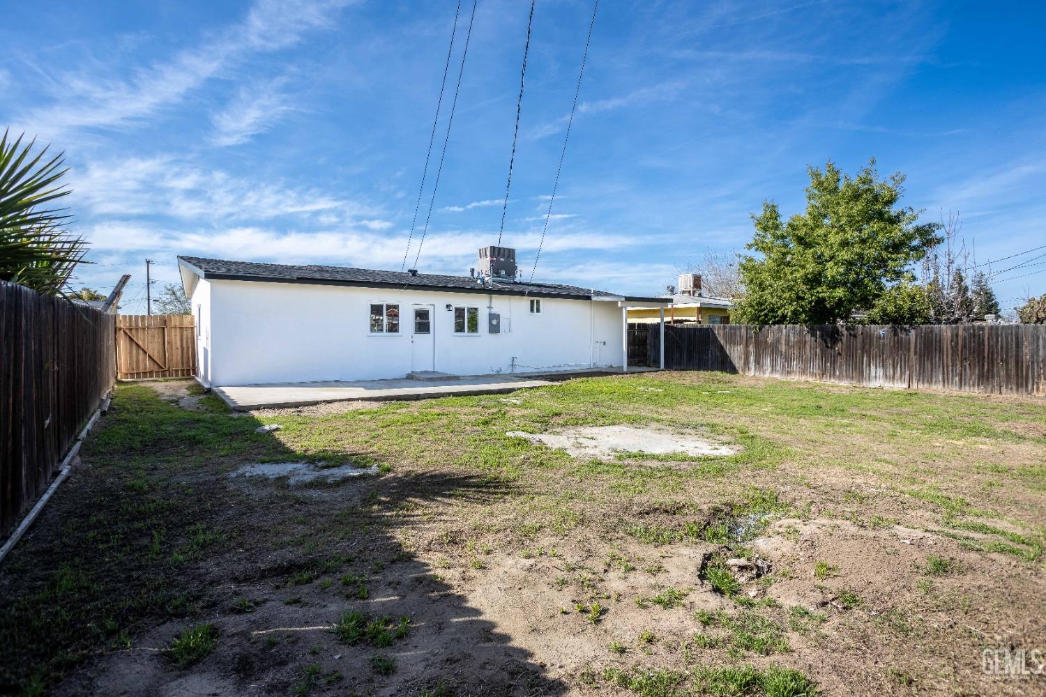 Undisclosed Address Shafter, CA 93263 - Photo 5 of 18 a view of a house with a yard