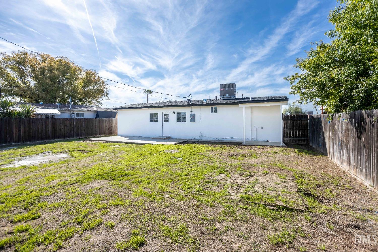 Undisclosed Address Shafter, CA 93263 - Photo 6 of 18 a front view of house with yard