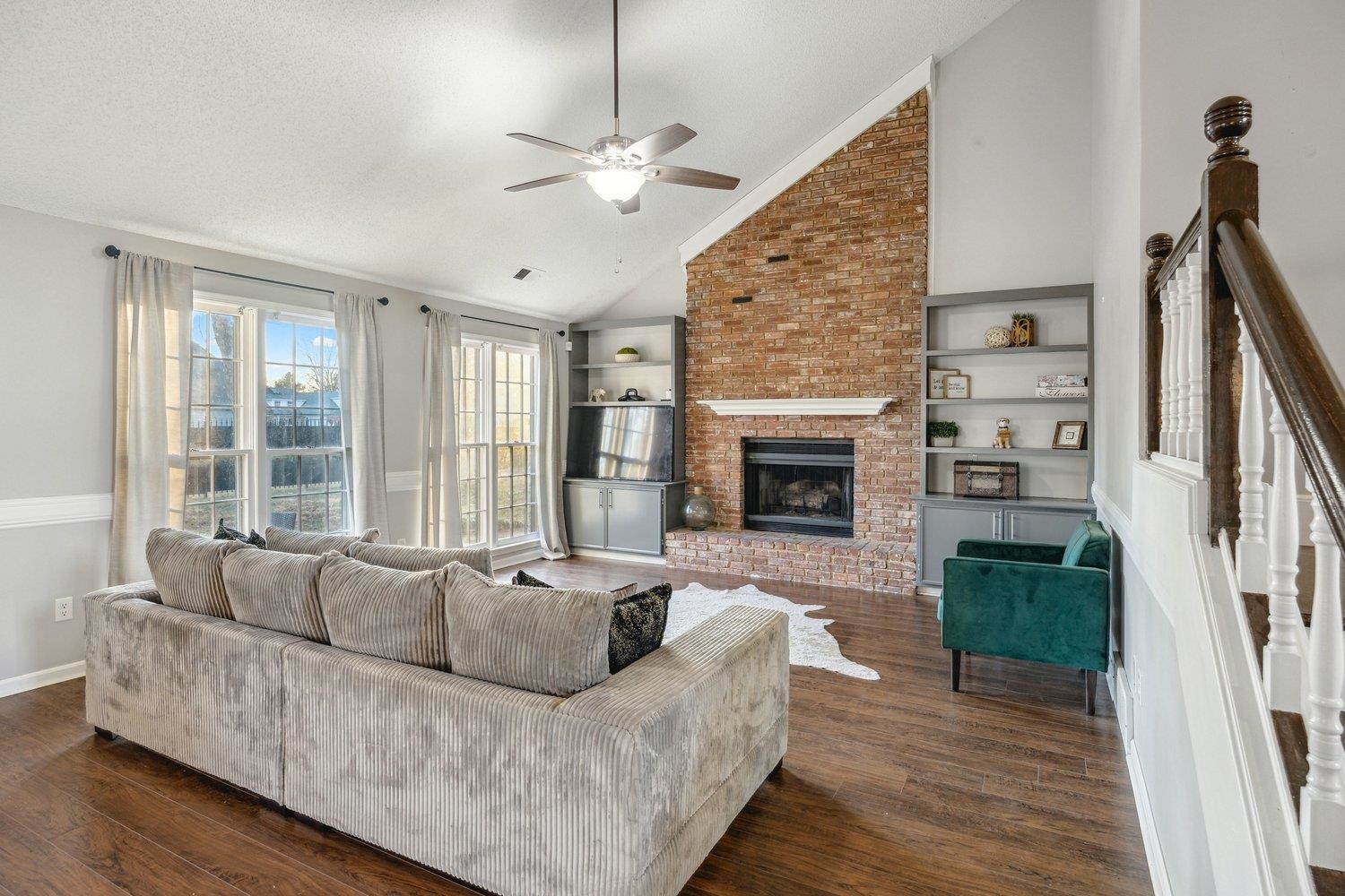 8747 Walnut Grove Road Memphis, TN 38018 - Photo 7 of 20 a living room with furniture and a fireplace