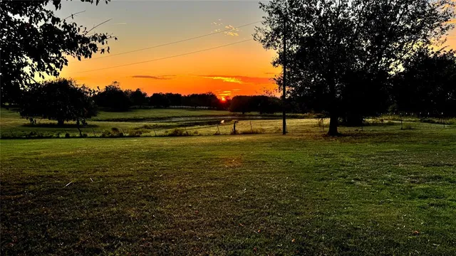 a view of swimming pool with a garden