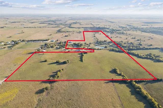 an aerial view of beach and ocean