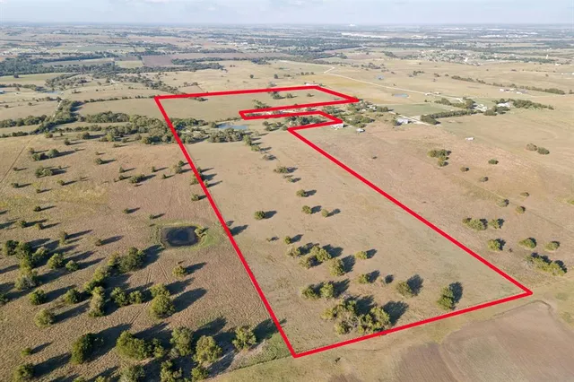 an aerial view of beach and ocean view
