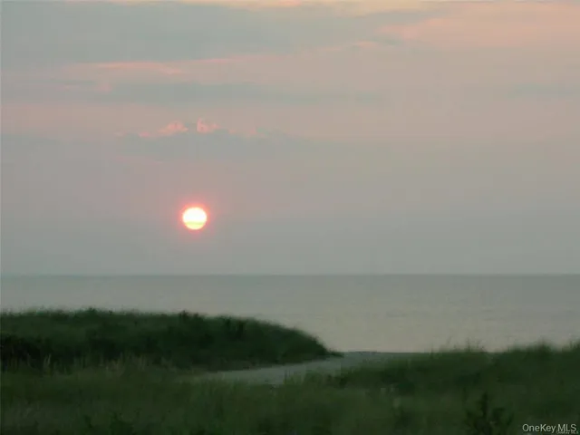 an outdoor space with lounge chair
