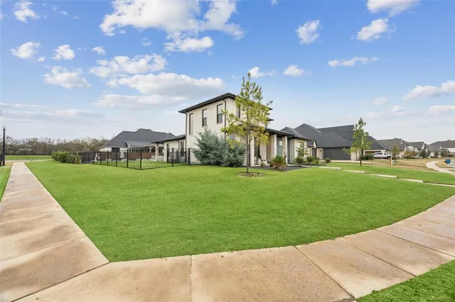 a view of a house with a big yard