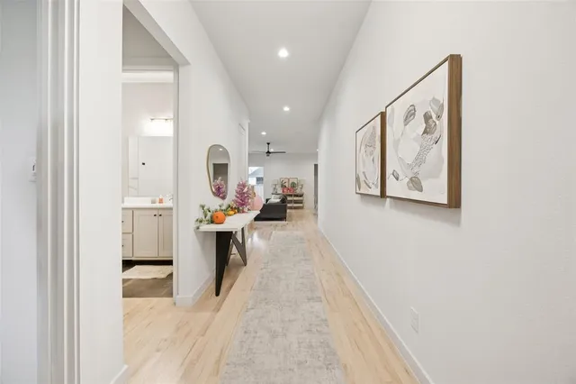 a view of a living room with a wooden floor
