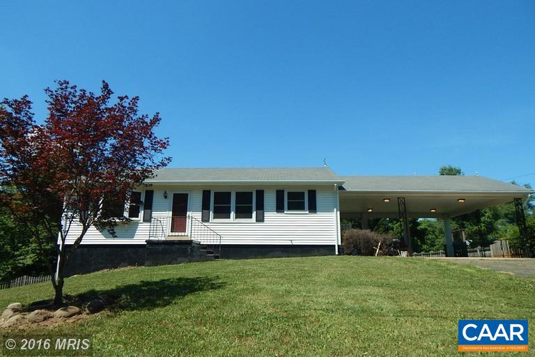 1822 James City Road Reva, VA 22735 - Photo 1 of 11 a front view of a house with a yard