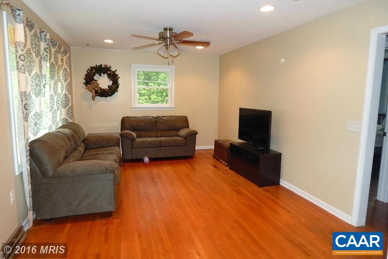 1822 James City Road Reva, VA 22735 - Photo 11 of 11 a living room with furniture and a flat screen tv