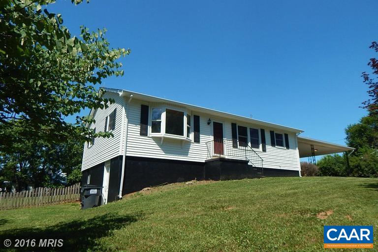 1822 James City Road Reva, VA 22735 - Photo 3 of 11 a front view of a house with a yard