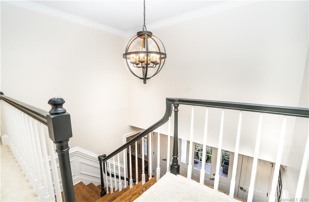 3256 Gray Moss Road Charlotte, NC 28270 - Photo 14 of 35 a view of staircase with railing and a window