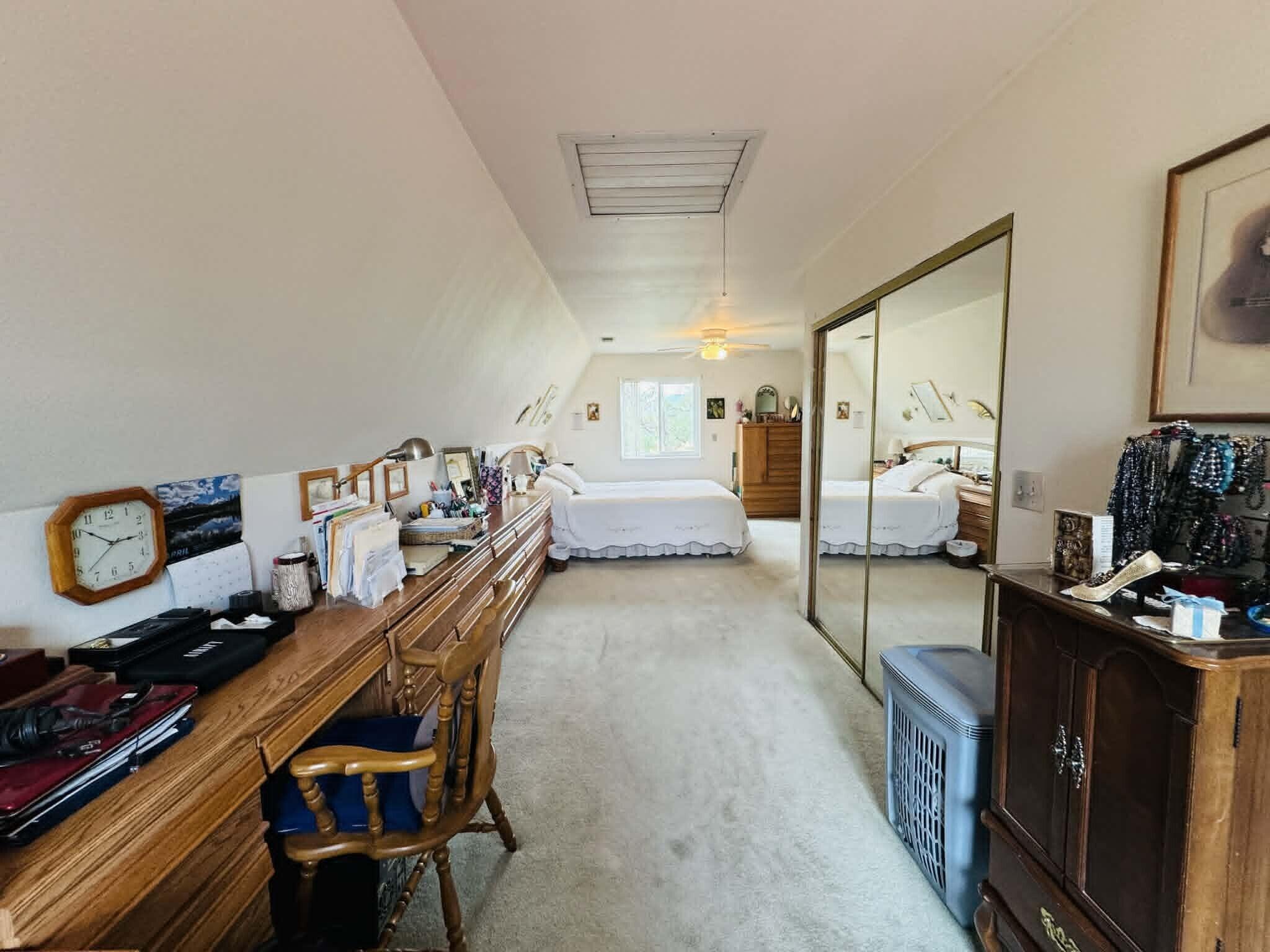 6231 Ridgetop Road Anderson, CA 96007 - Photo 34 of 49 a bedroom with furniture and a tv