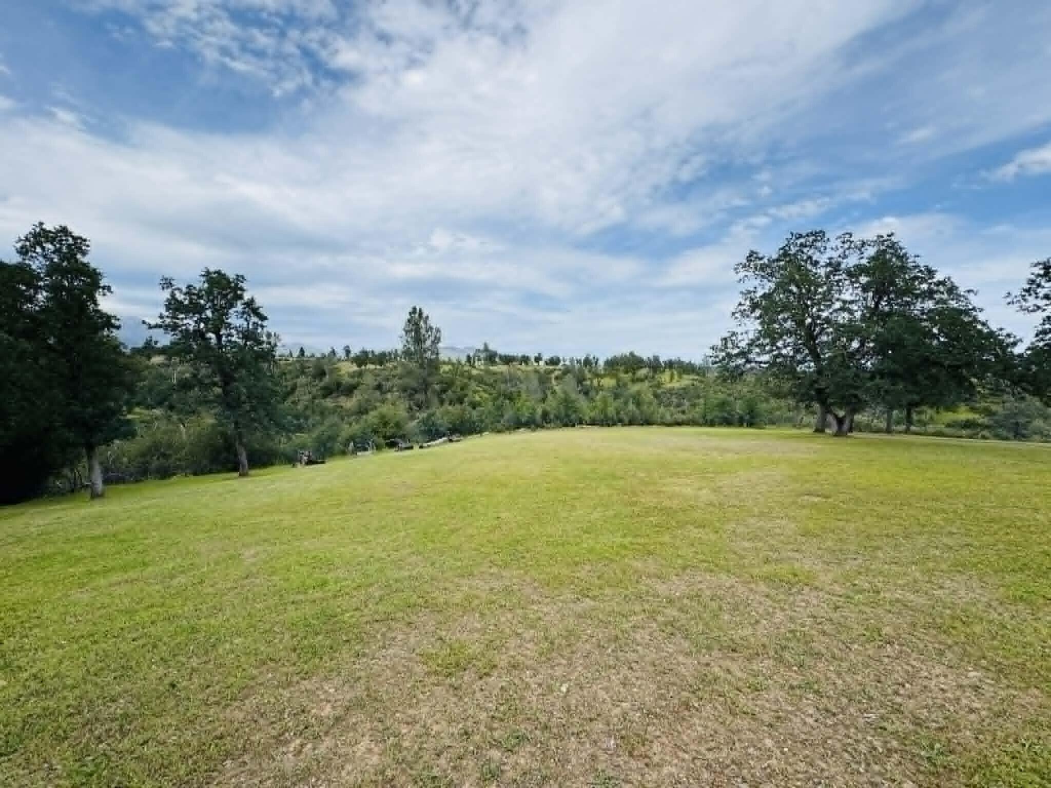 6231 Ridgetop Road Anderson, CA 96007 - Photo 47 of 49 a view of a field with an ocean