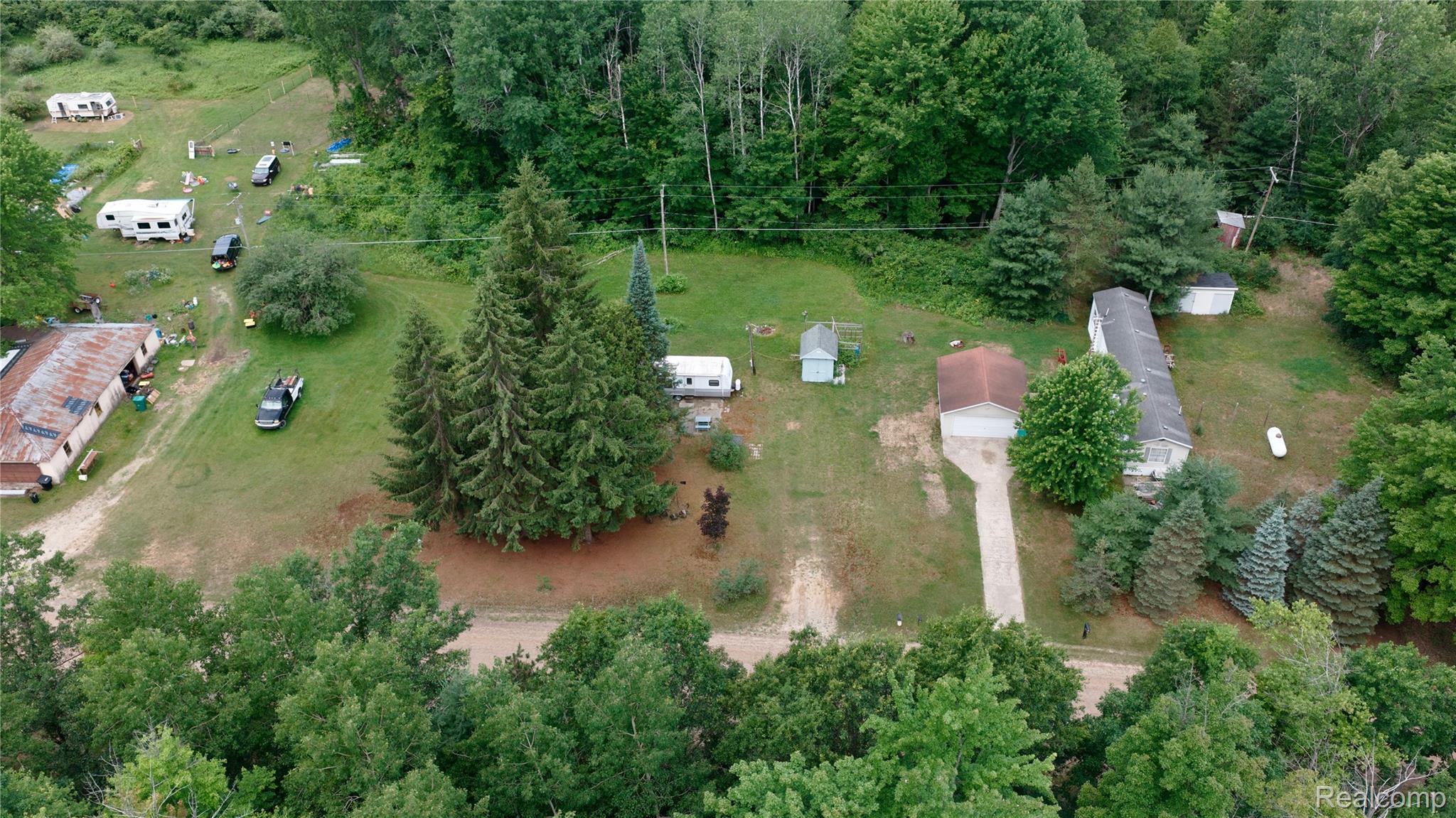 1900 Hay Road Beaverton, MI 48612 - Photo 2 of 8 dji_fly_20260702_103934_0412_1783005005334_photo.jpeg