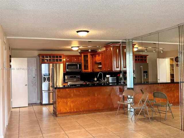 a view of a chairs in a kitchen