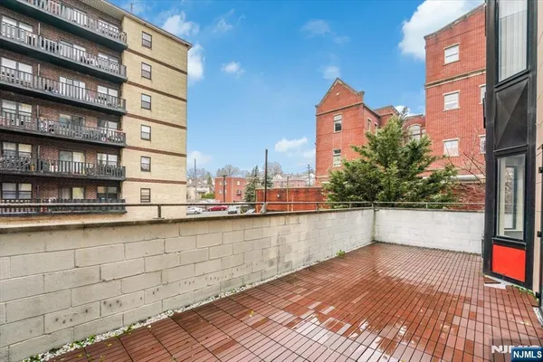 a lobby with a glass door and glass door