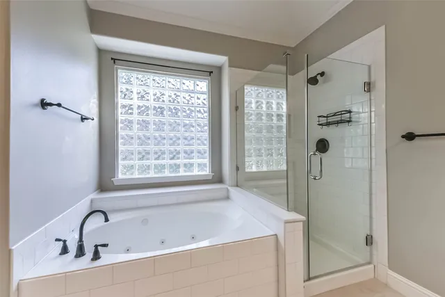 a house with a large pool in front of it