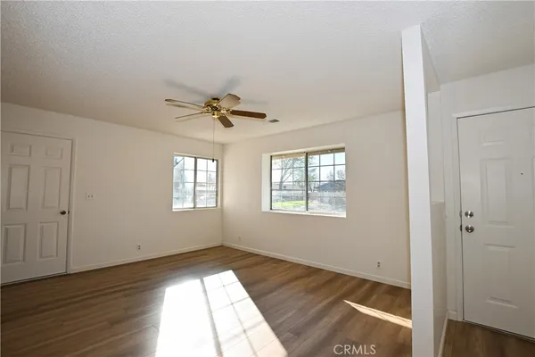 a view of an empty room and window