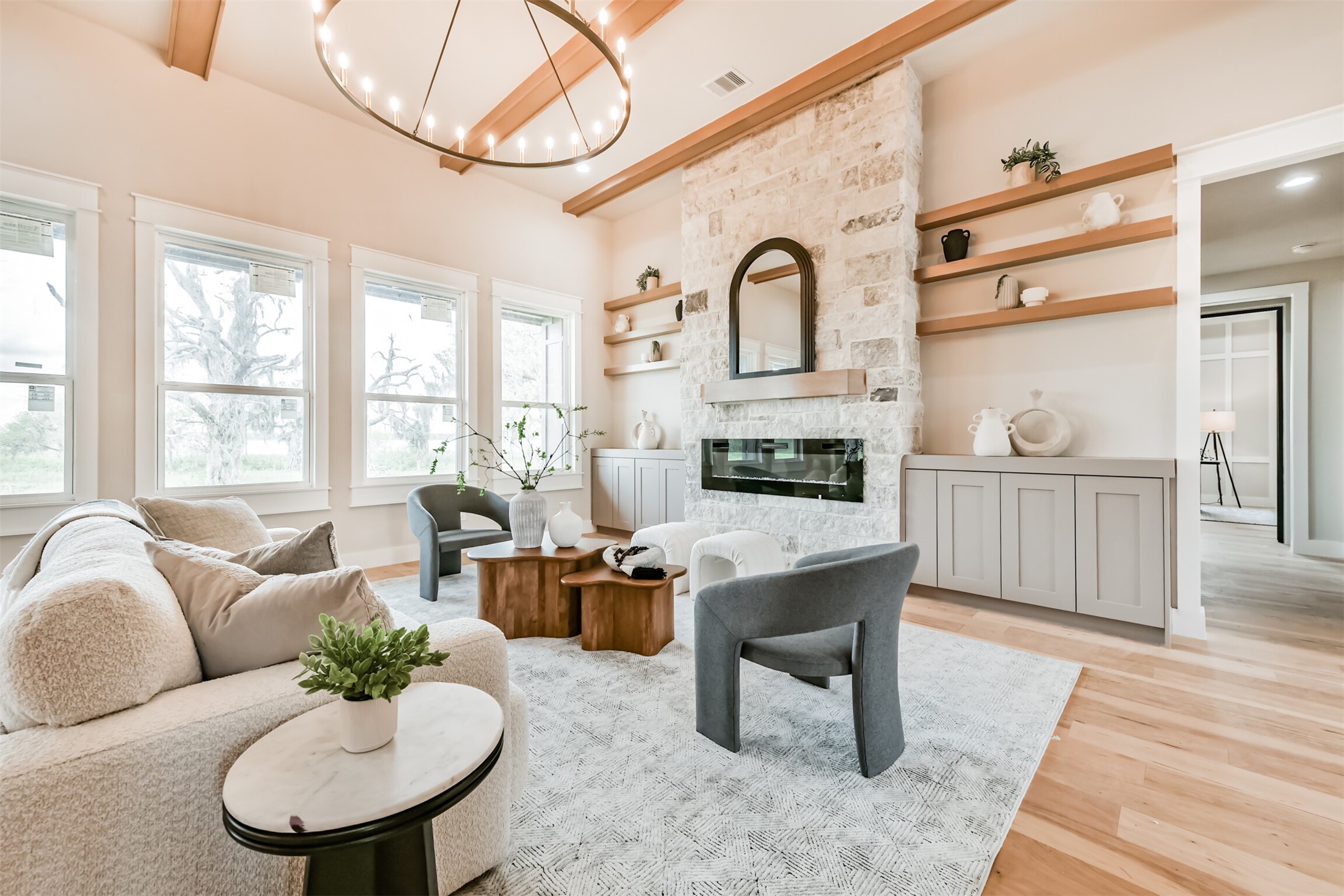 250 Pony Trail Angleton, TX 77515 - Photo 31 of 32 Experience a spacious open floor plan with stunning beam accents and soaring ceilings.