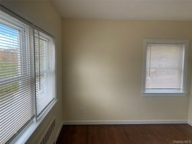 a view of a room that has a window