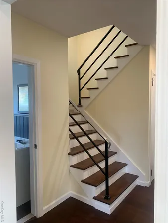 a view of entryway with wooden floor