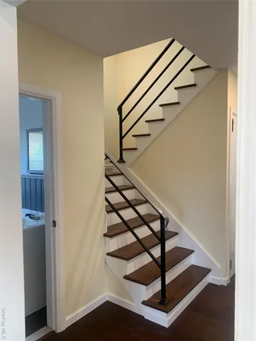 a view of entryway with wooden floor