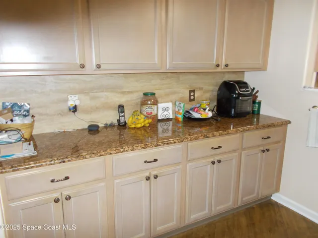 a view of a bedroom from a hallway