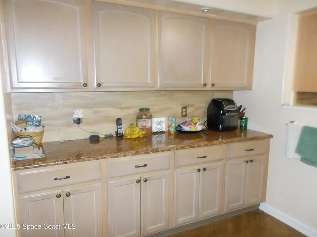 a view of a wooden fence