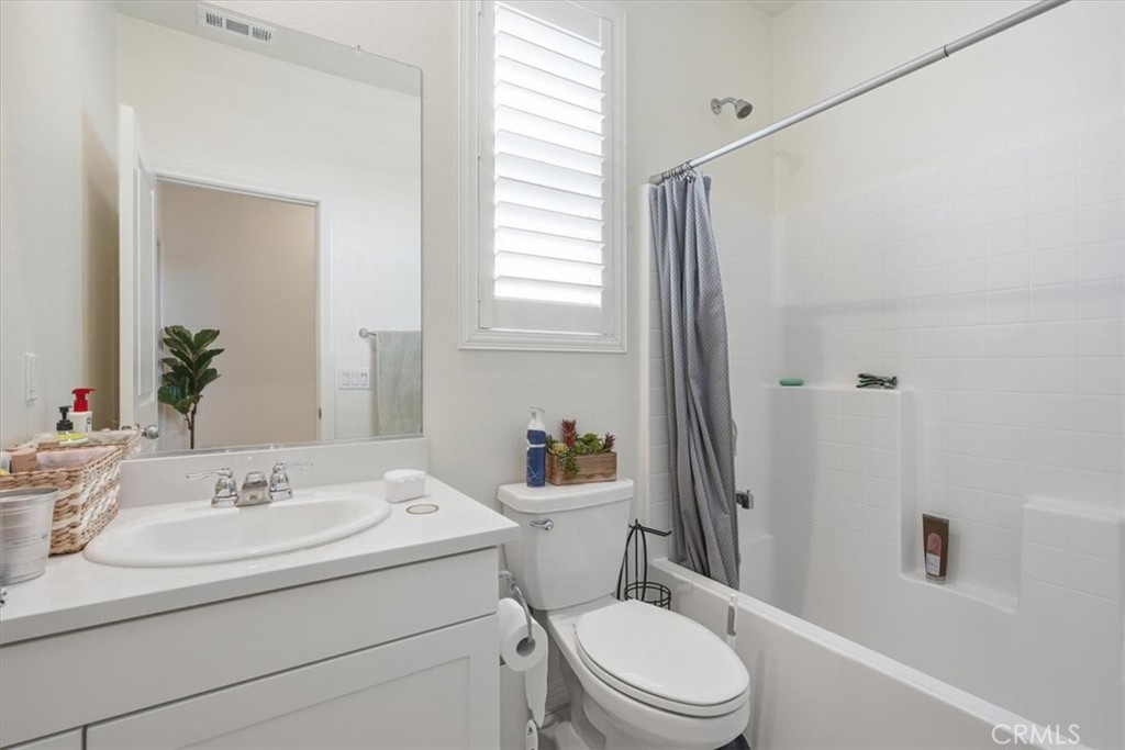 32350 Iron Trail Road Winchester, CA 92596 - Photo 23 of 32 a bathroom with a sink toilet and shower