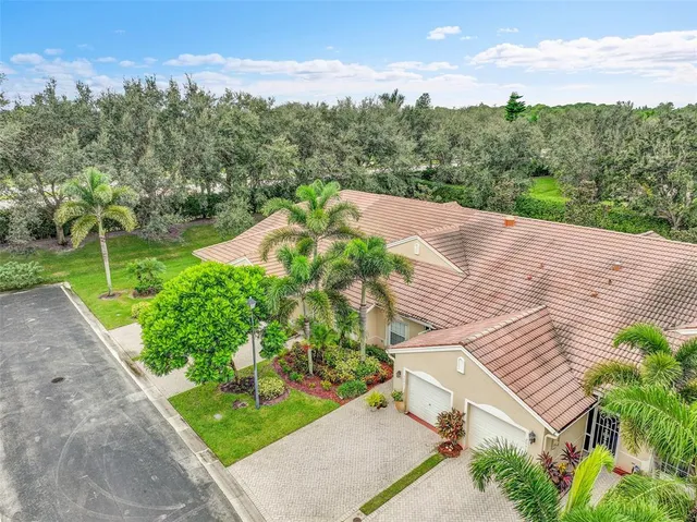 a view of a backyard with garden