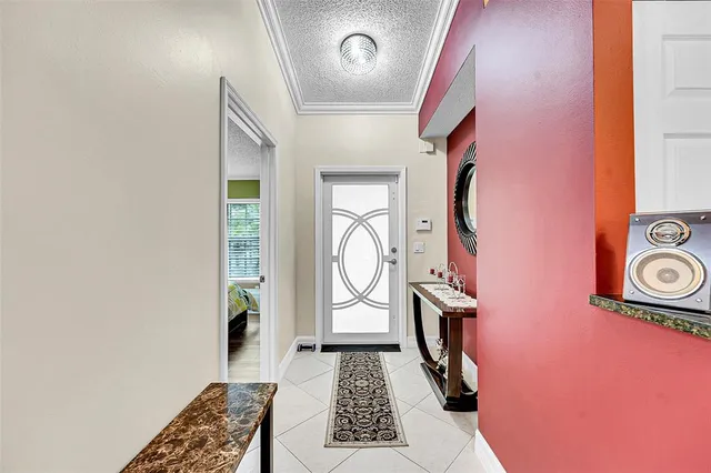 a view of an entryway with a rug