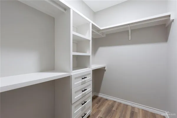 a view of an empty walk in closet
