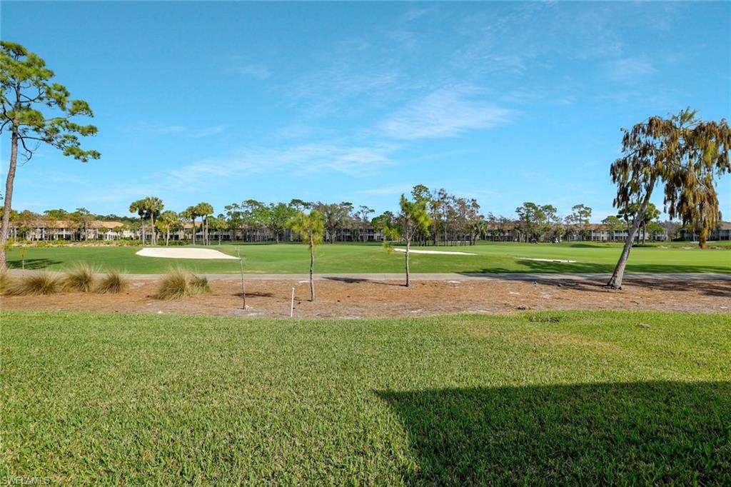 8457 Radcliffe Terrace, Unit 102 Naples, FL 34120 - Photo 22 of 33 View of property's community featuring golf course view