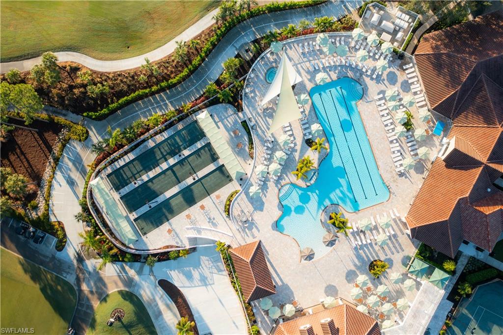 8457 Radcliffe Terrace, Unit 102 Naples, FL 34120 - Photo 29 of 33 Drone / aerial view of a pool