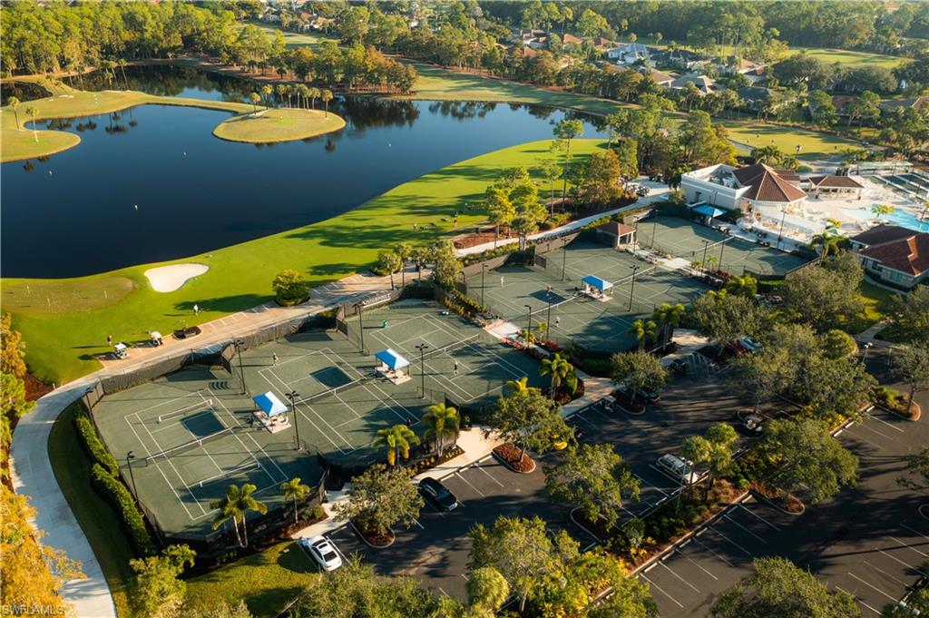 8457 Radcliffe Terrace, Unit 102 Naples, FL 34120 - Photo 30 of 33 Bird's eye view of a large body of water and a golf club