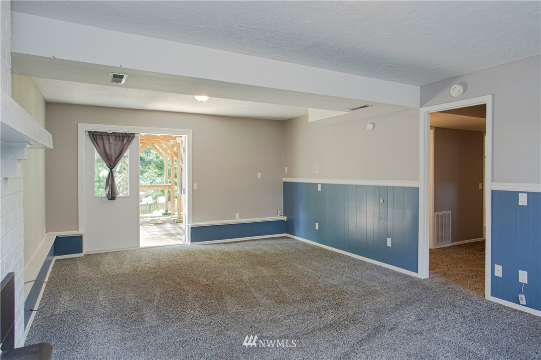 17522 Brook Boulevard Bothell, WA 98012 - Photo 14 of 35 a view of an empty room with a window