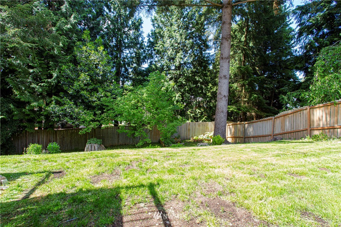 17522 Brook Boulevard Bothell, WA 98012 - Photo 23 of 35 a view of swimming pool with a small yard