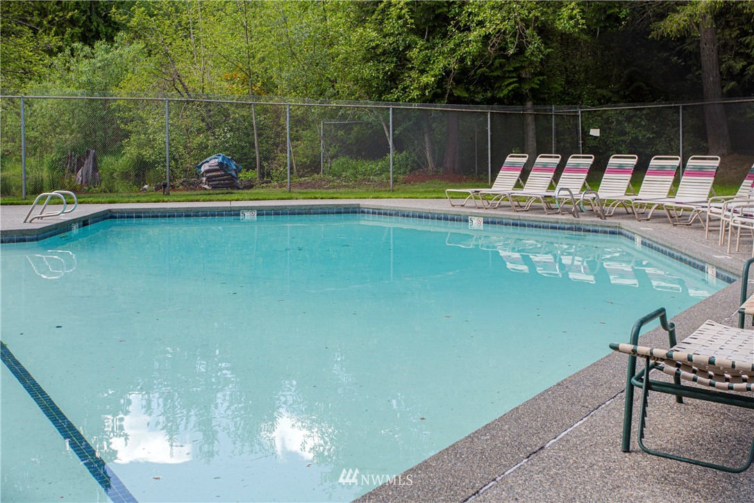 17522 Brook Boulevard Bothell, WA 98012 - Photo 29 of 35 a view of a lake with a yard