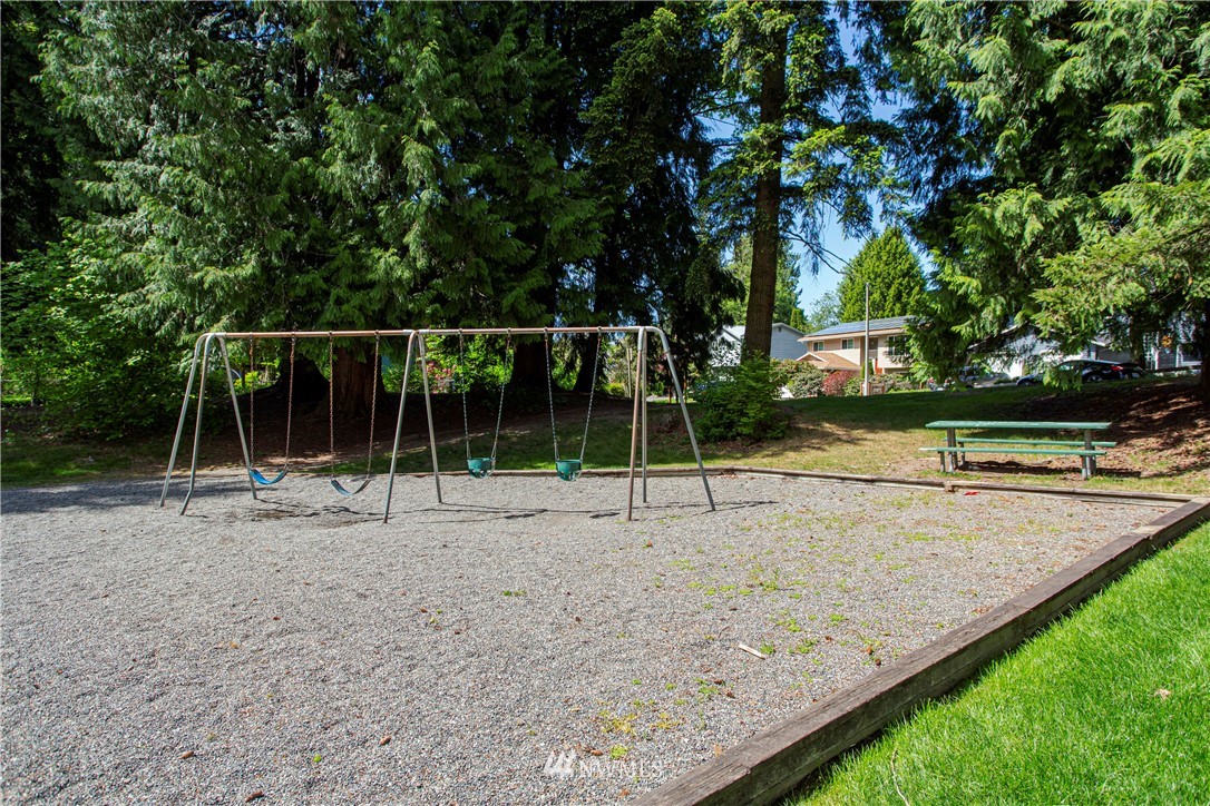 17522 Brook Boulevard Bothell, WA 98012 - Photo 33 of 35 a view of a backyard with swings