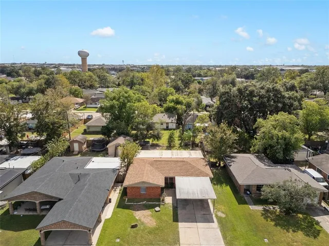 an aerial view of a house with a garden