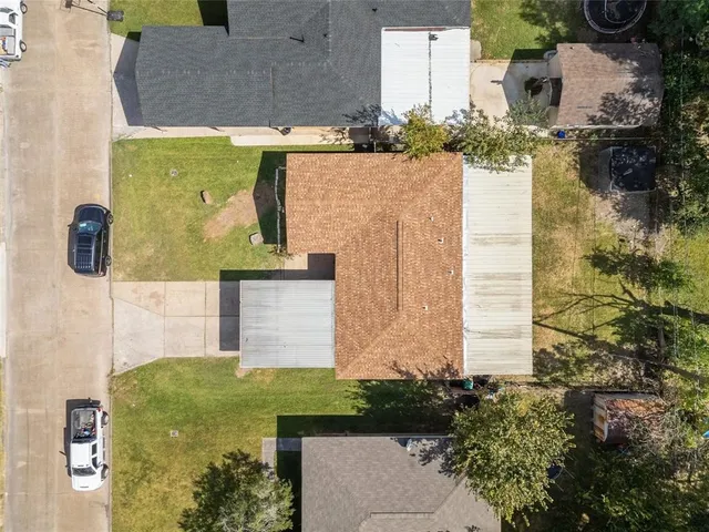 a aerial view of a house with a garden