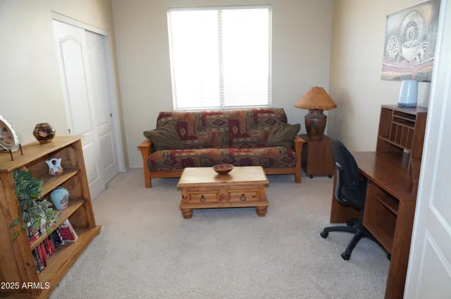 a bathroom with a sink a toilet and a shower curtain