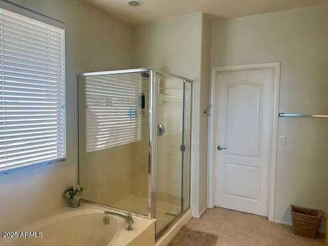 a bathroom with a double vanity sink mirror and double
