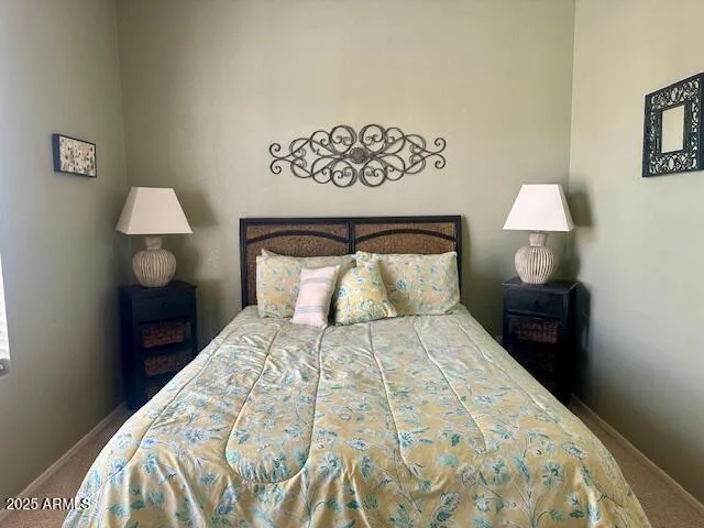 a view of a chairs and table in patio