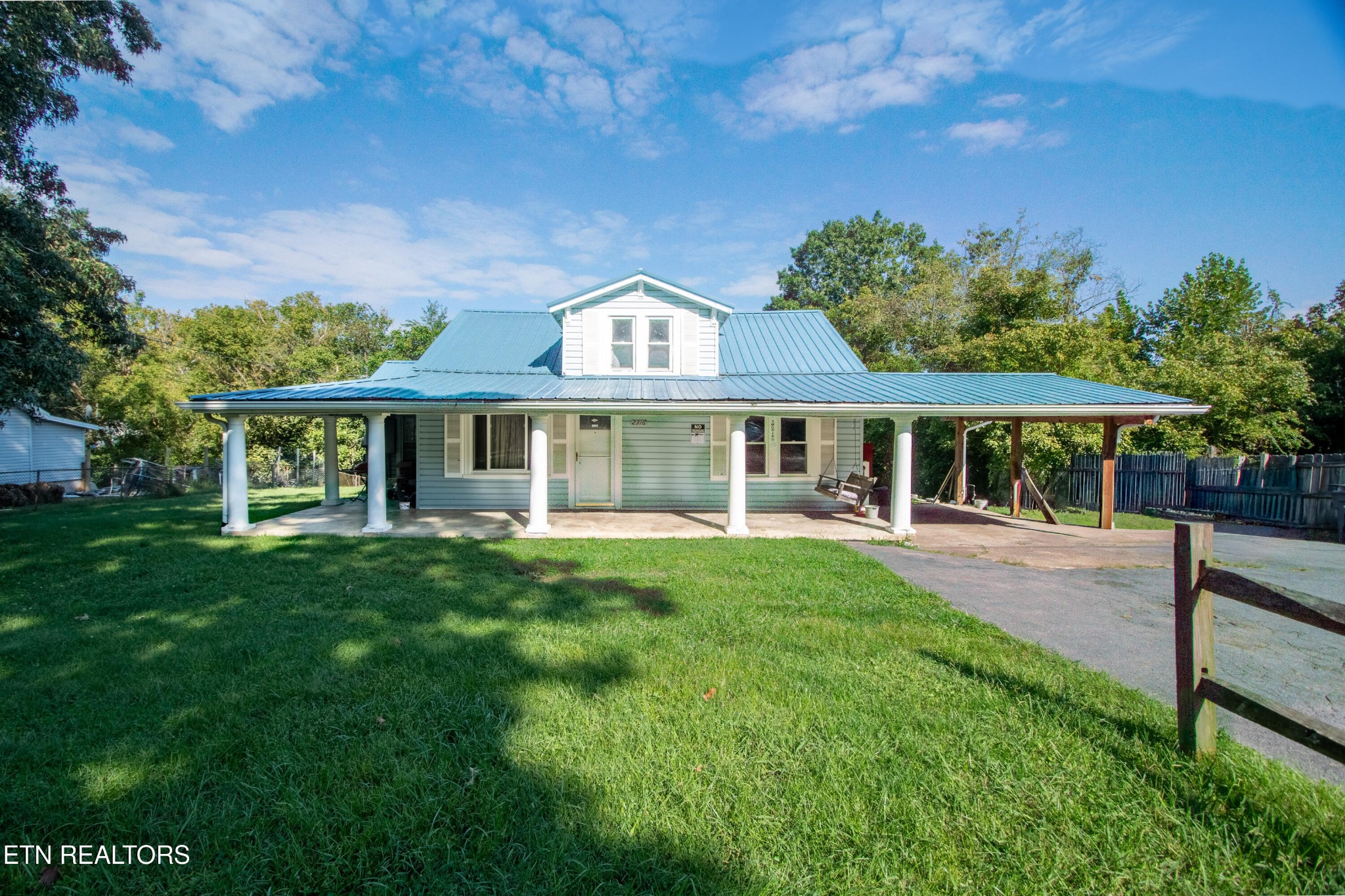 2316 Reservoir Road Kingsport, TN 37660 - Photo 1 of 22 a front view of a house with a yard