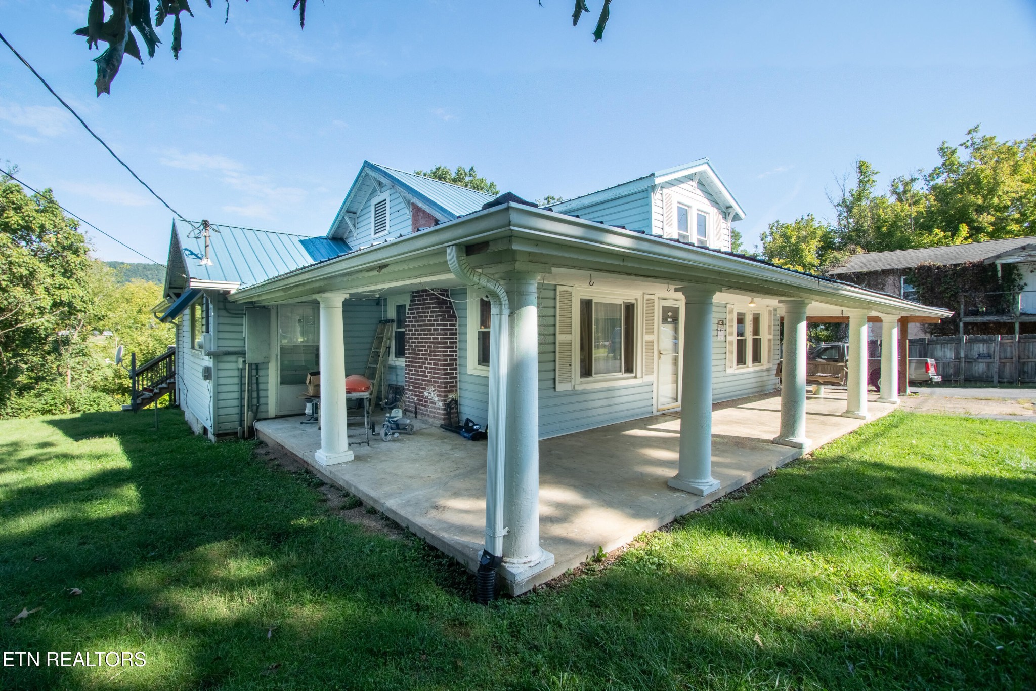 2316 Reservoir Road Kingsport, TN 37660 - Photo 2 of 22 a view of a house with a yard patio and a garden