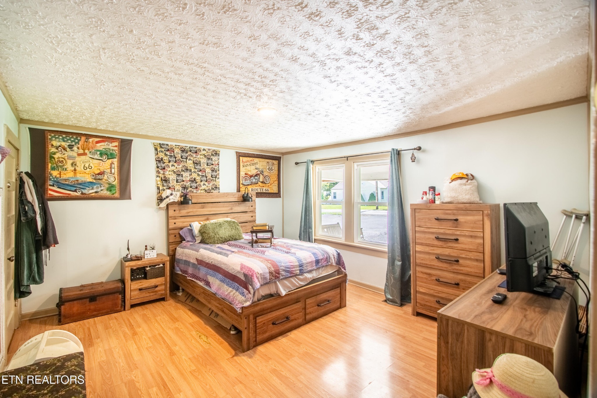 2316 Reservoir Road Kingsport, TN 37660 - Photo 6 of 22 a bedroom with a bed and a flat tv screen on dresser