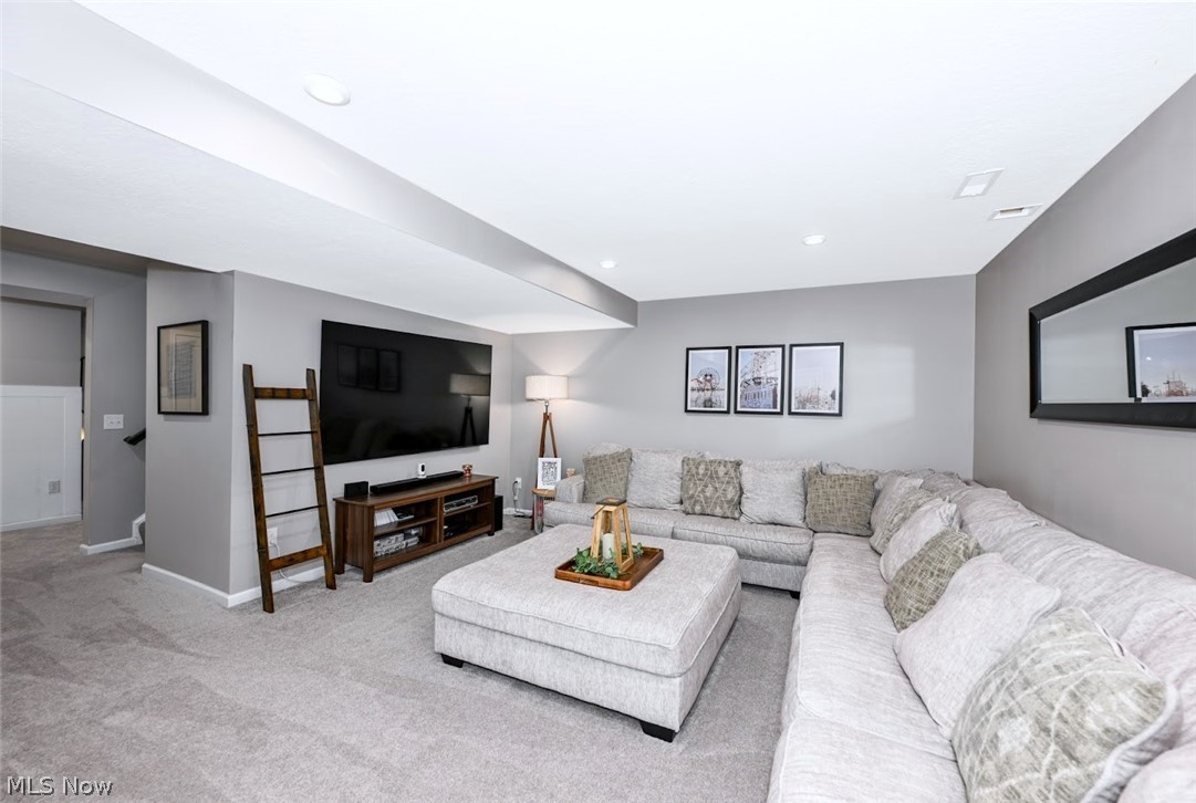 3021 Stonehurst Road Uniontown, OH 44685 - Photo 32 of 48 *FINISHED BASEMENT RECREATION ROOM! SOFT COZY NEW CARPET, MINI FRIDGE AND DRY BAR CABINETS, COUNTERTOP ~