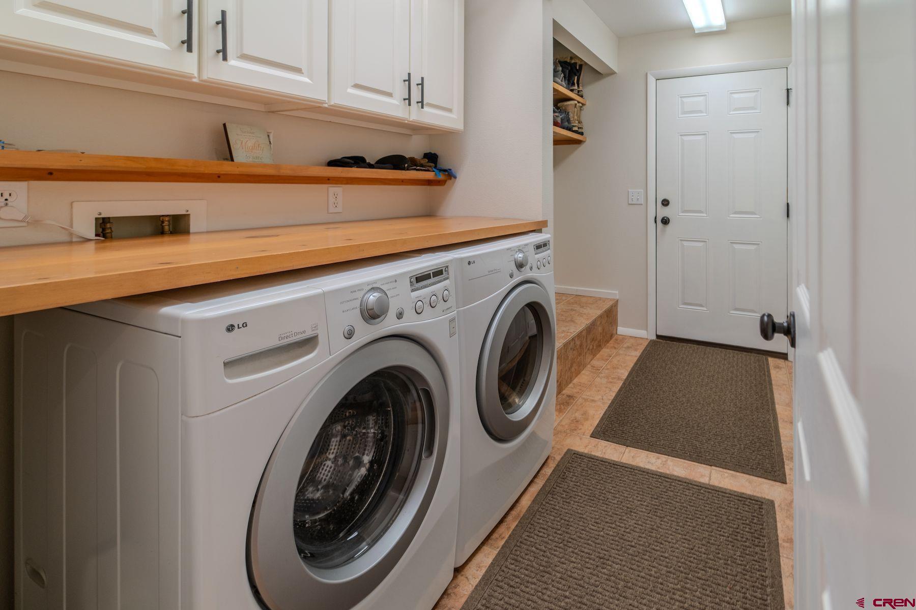 34 Crocus Court Durango, CO 81301 - Photo 11 of 30 a utility room with dryer and washer