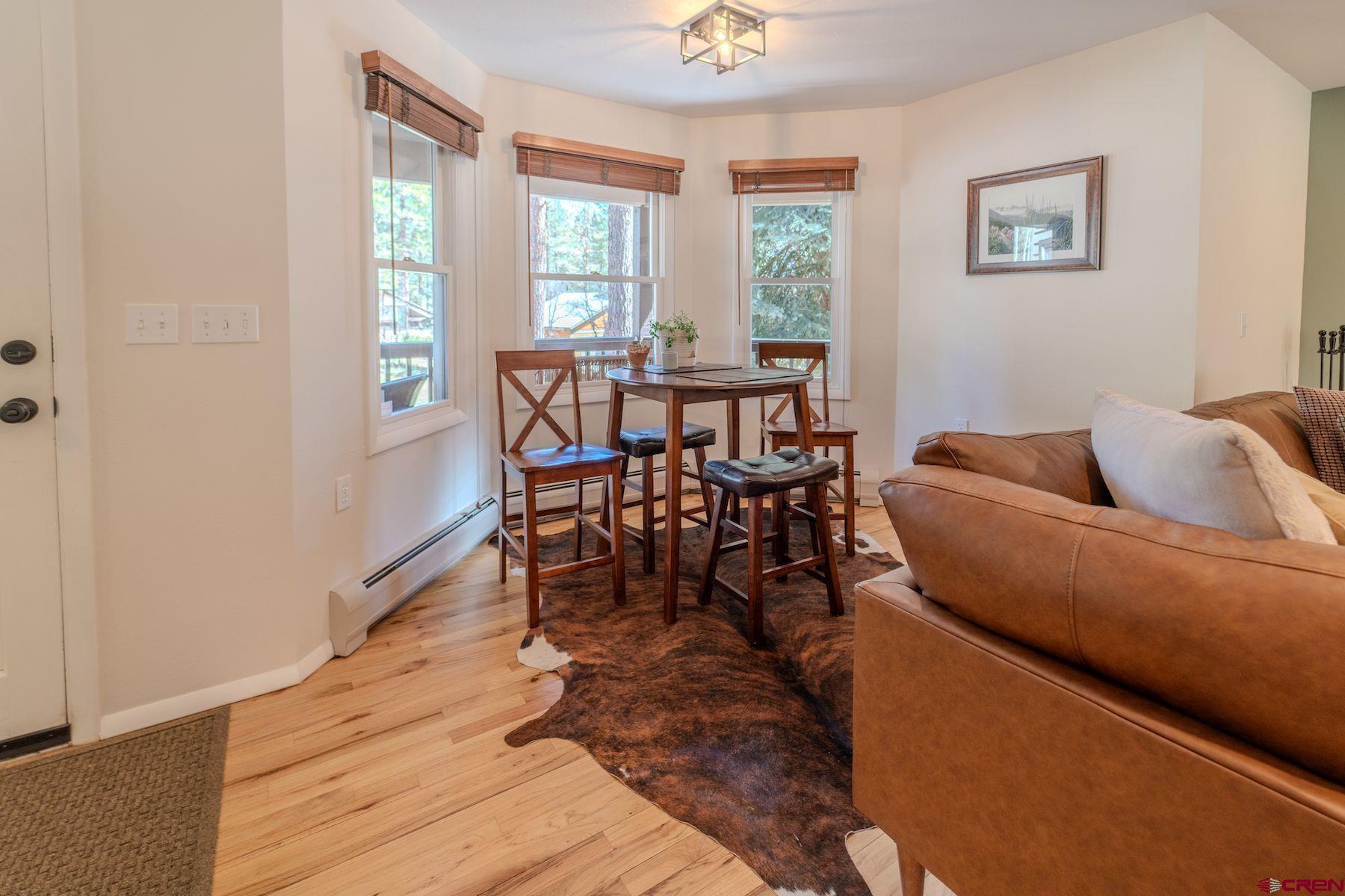 34 Crocus Court Durango, CO 81301 - Photo 12 of 30 a living room with furniture and a window